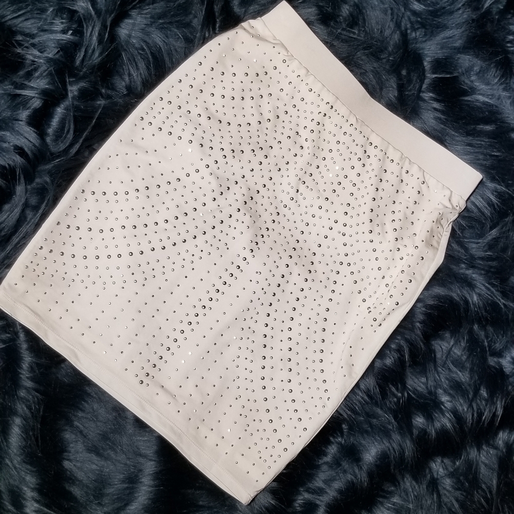 Silver studded white mini skirt